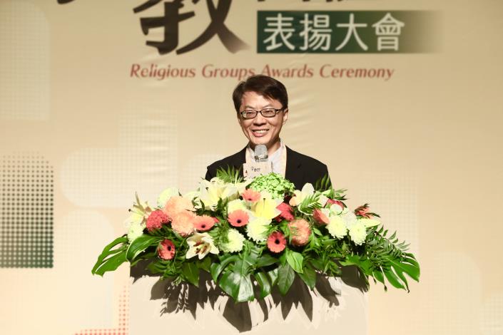 圖1內政部主任秘書黃駿逸致詞