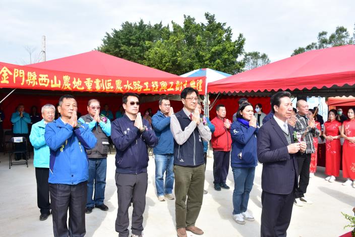 Praying for blessings during the groundbreaking ceremony