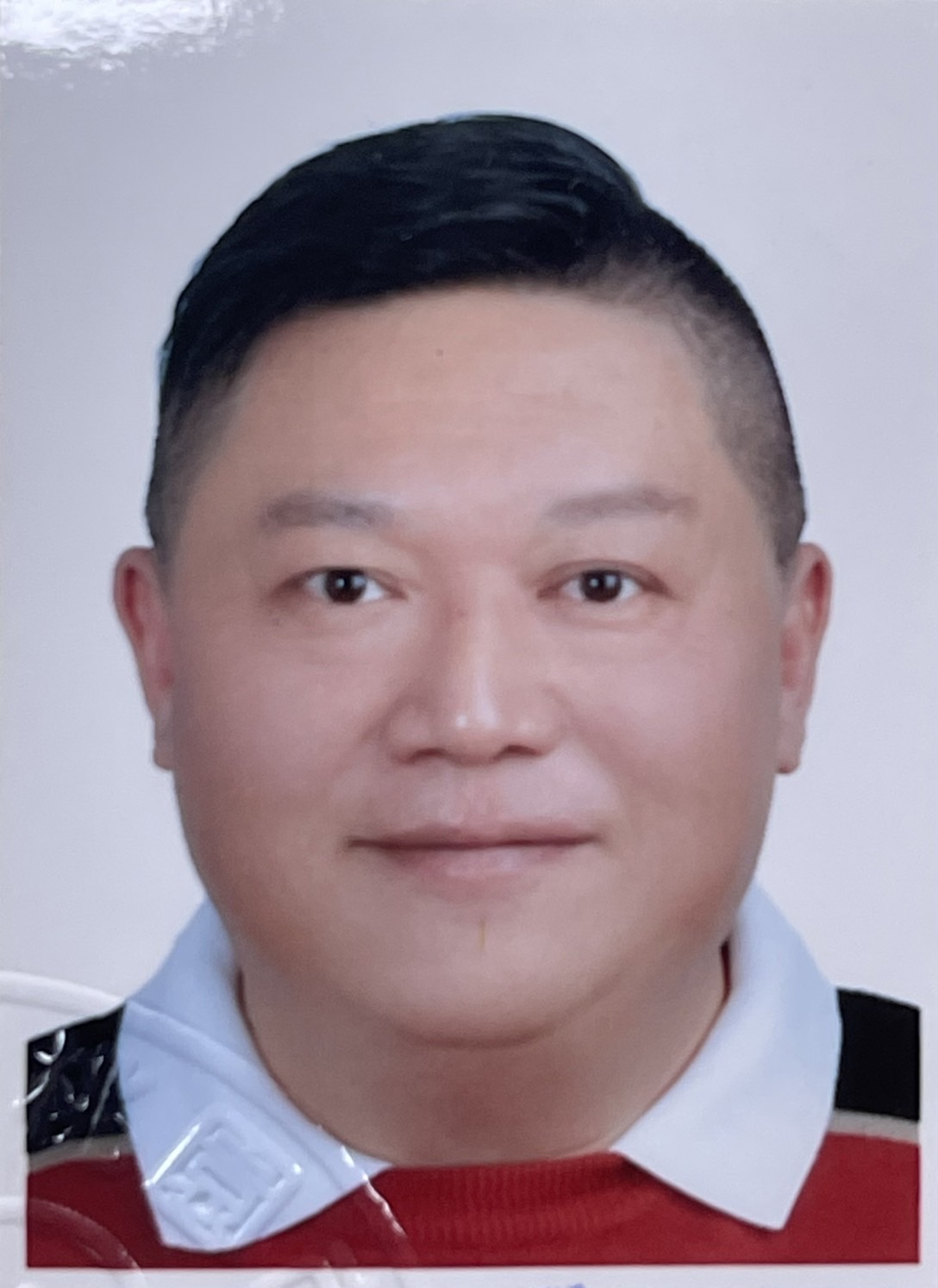 李　建銘