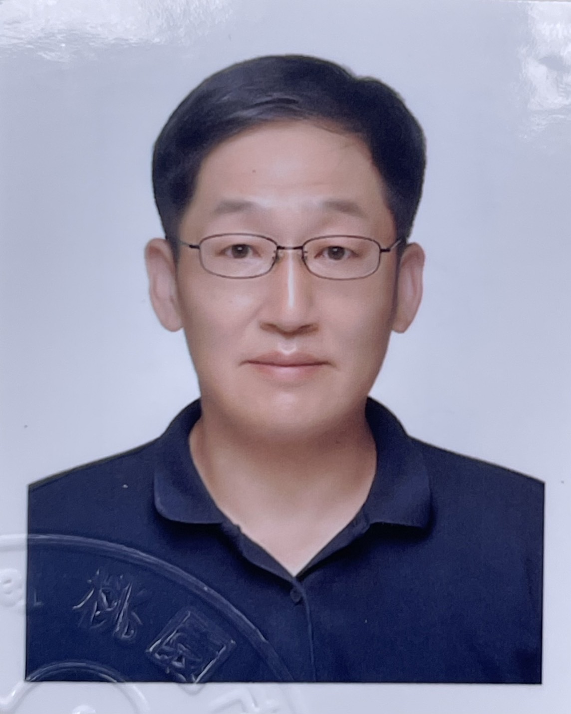 張　修文
