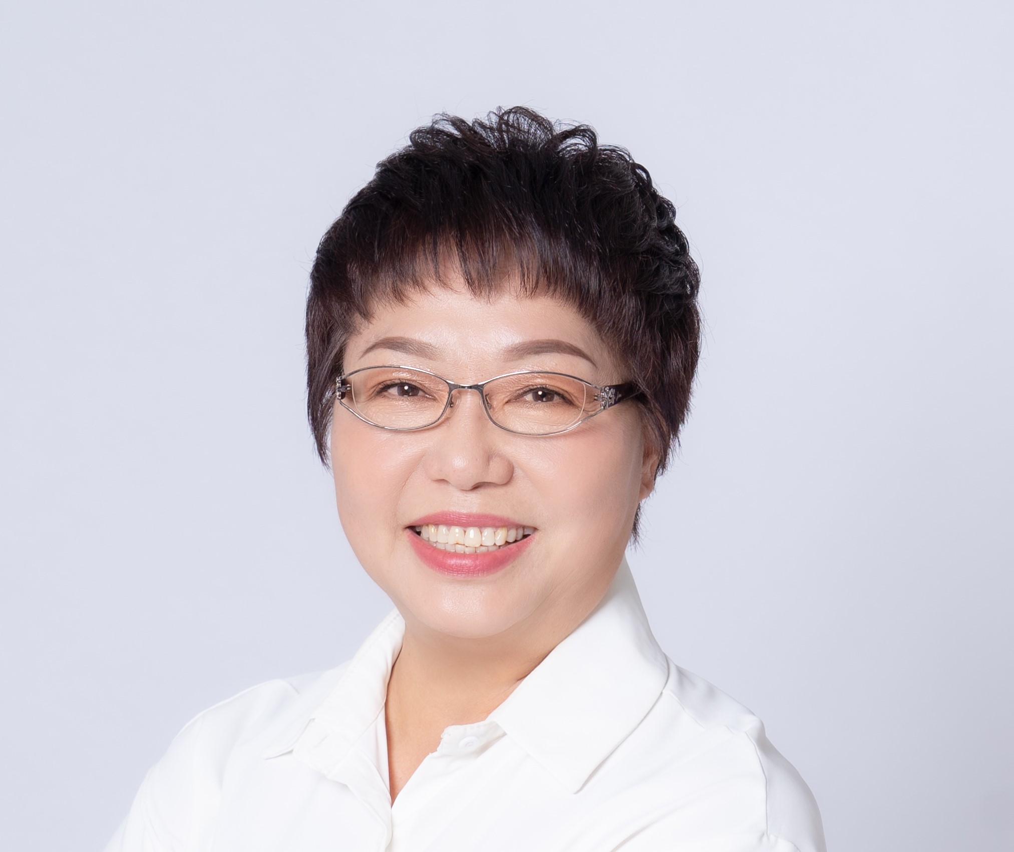 何　麗觀
